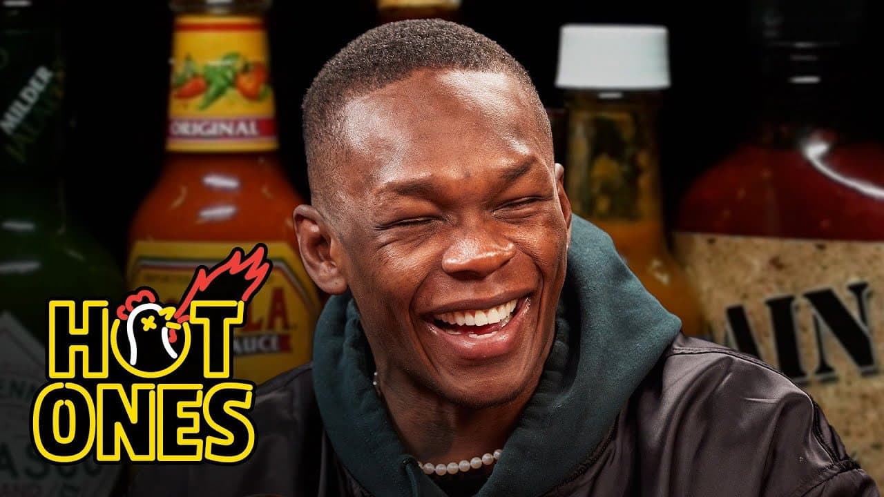 Still from Israel Adesanya Gives Thanks While Eating Spicy Wings
