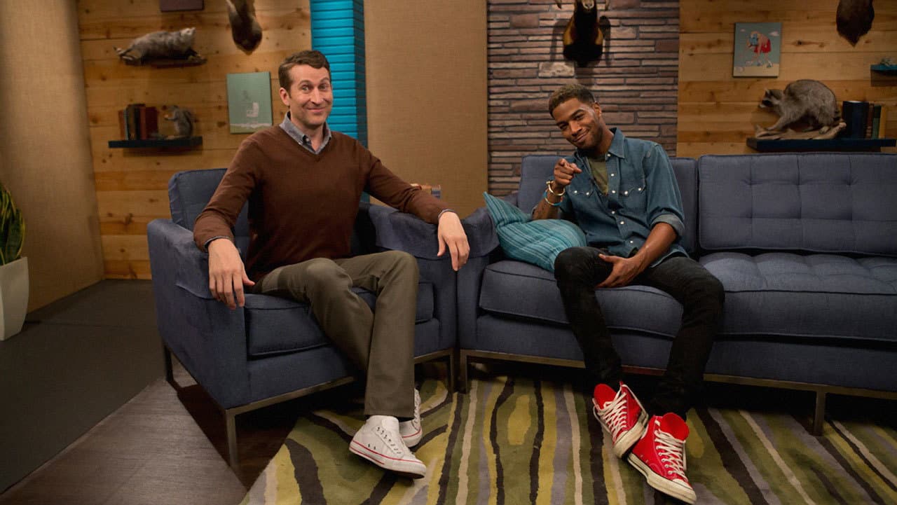 Still from Kid Cudi Wears a Denim Shirt and Red Sneakers