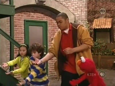 Still from Chris Teaches Elmo How to Bowl