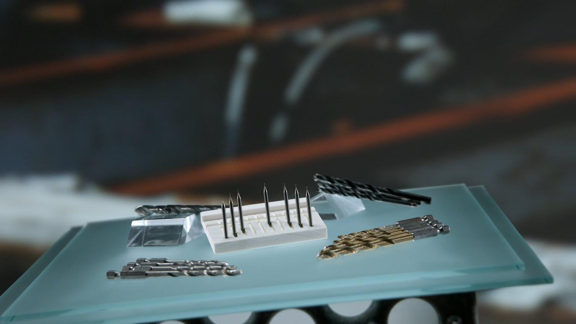 Still from Compression & Extension Springs, Micro Drill Bits, Skiffs, Painted Glass Backsplashes