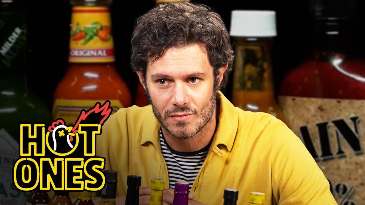 Still from Adam Brody Surfs Through the Pain While Eating Spicy Wings
