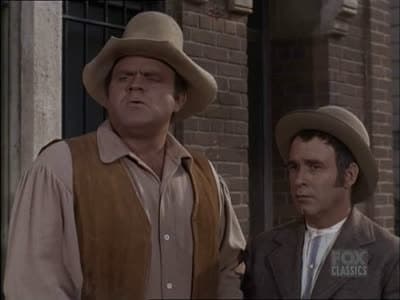 Still from The Tax Collector