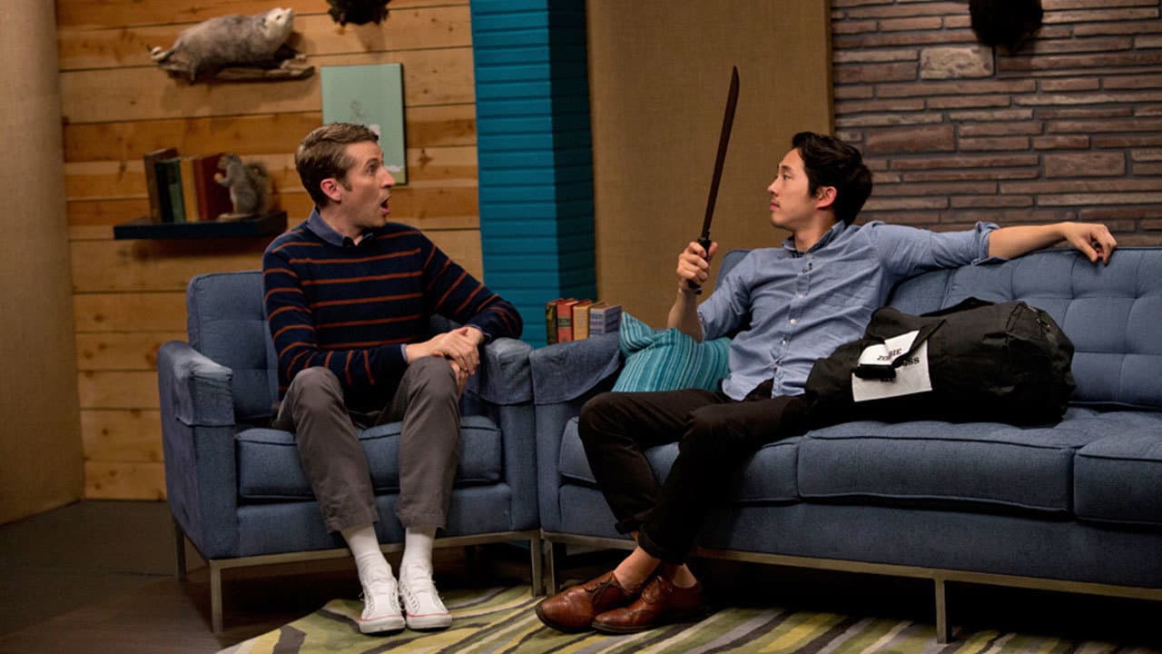 Still from Steven Yeun Wears Rolled Up Black Jeans & No Socks
