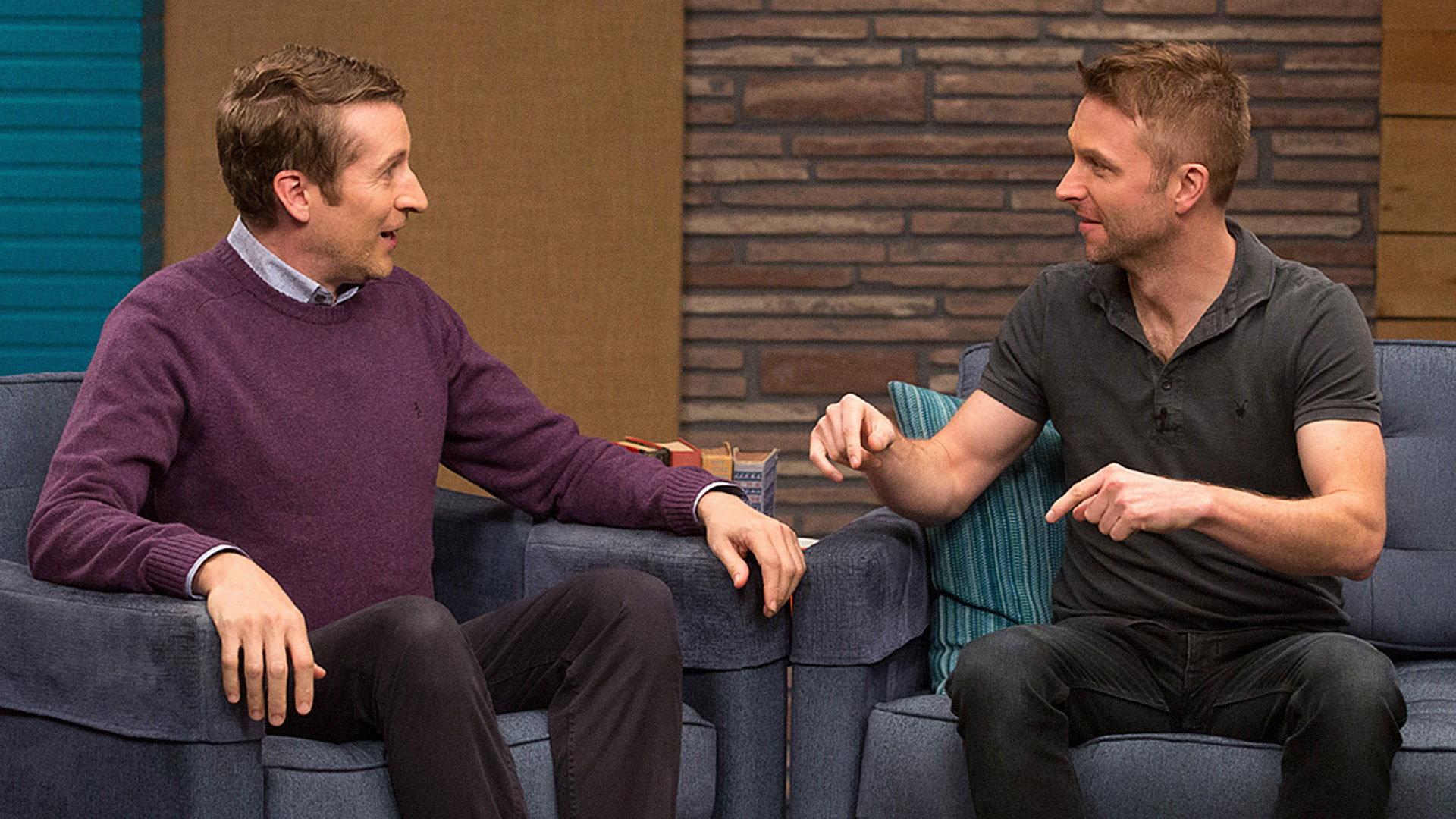Still from Chris Hardwick Wears a Black Polo & Weathered Boots