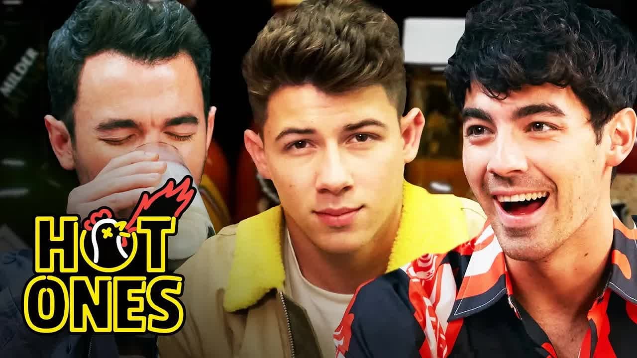 Still from The Jonas Brothers Burn Up While Eating Spicy Wings