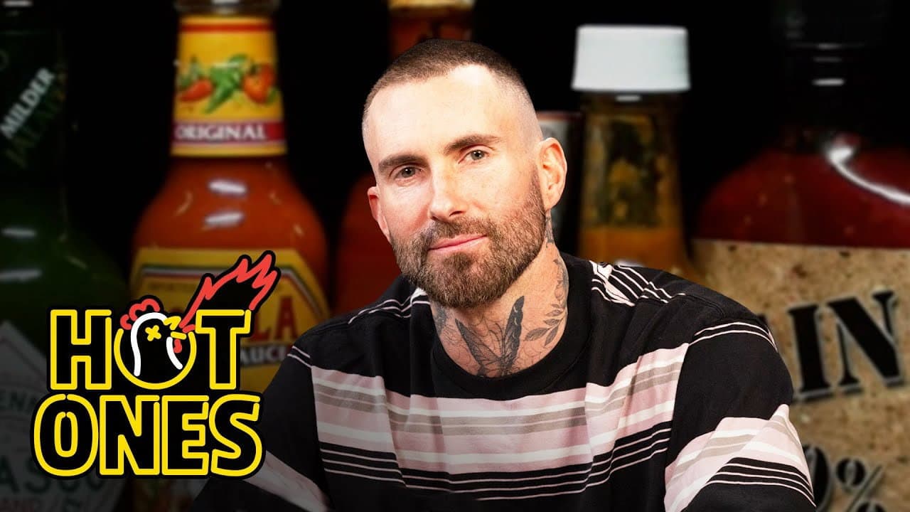 Still from Adam Levine Gives a Halftime Speech While Eating Spicy Wings