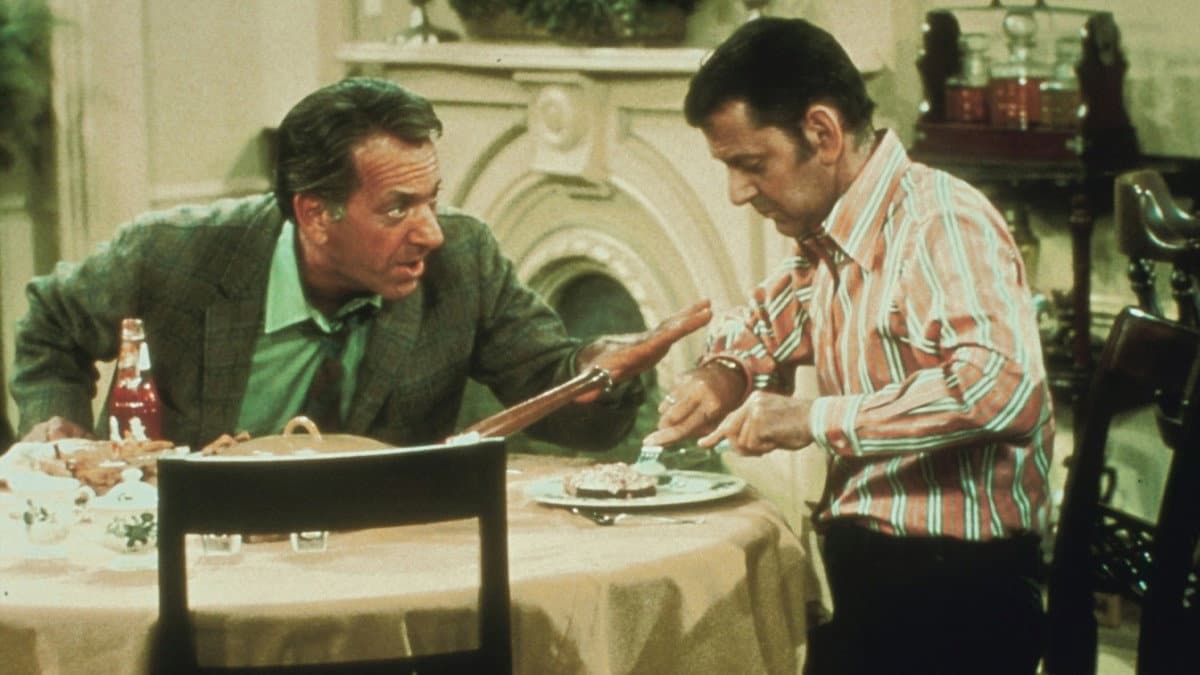 Still from The Odd Couple Meet Their Host