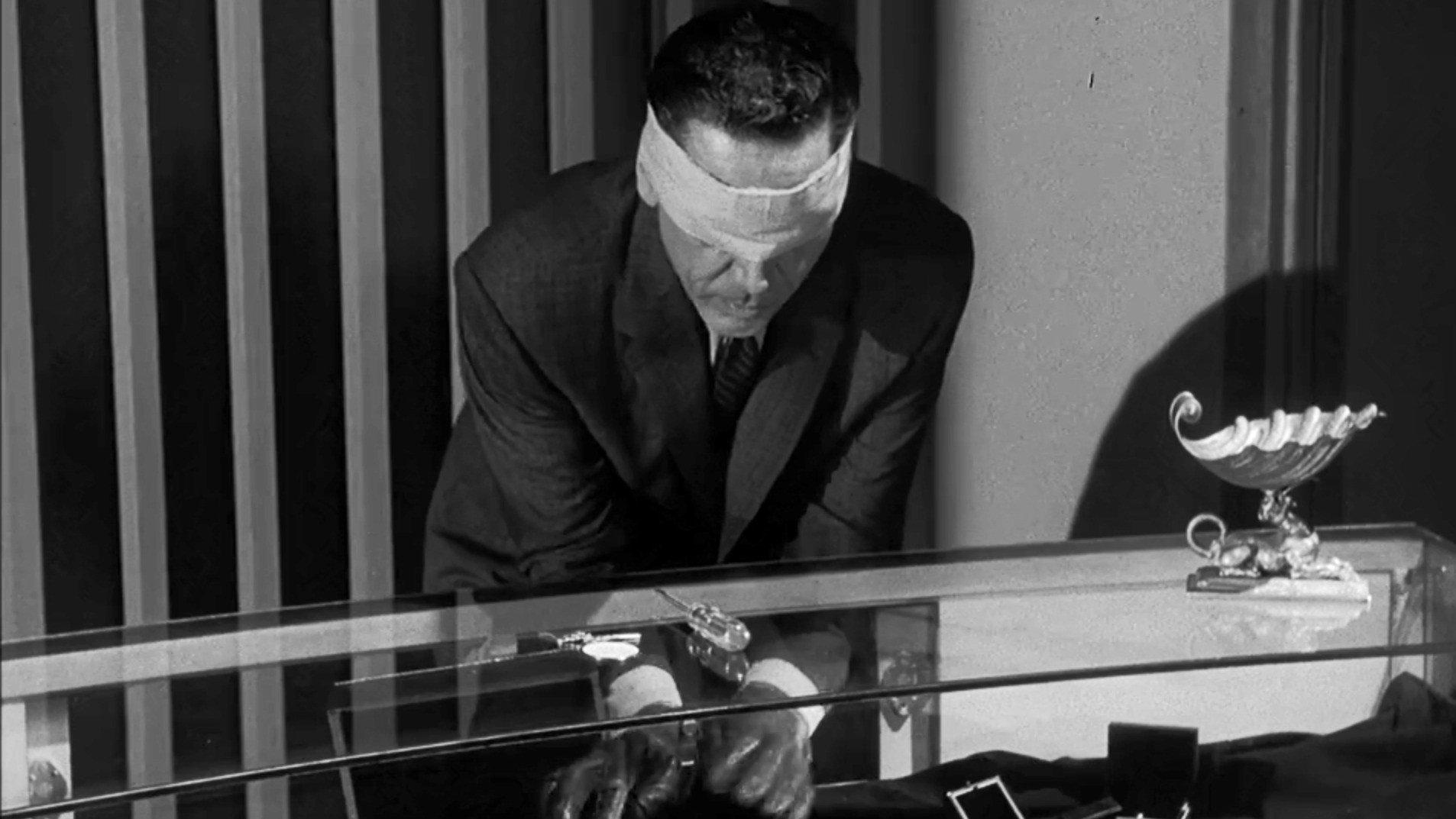 Still from The Case of the Blind Man's Bluff