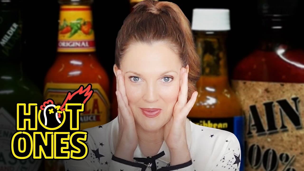 Still from Drew Barrymore Has a Hard Time Processing While Eating Hot Wings