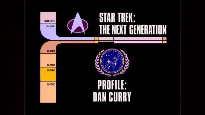 Still from Archival Mission Log: Year Six - Departmental Briefing: Profile: Dan Curry
