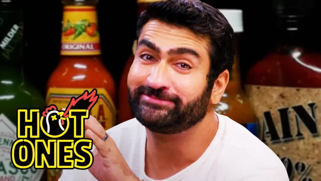 Still from Kumail Nanjiani Sweats Intensely While Eating Spicy Wings