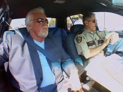 Still from Security for Kenny Rogers
