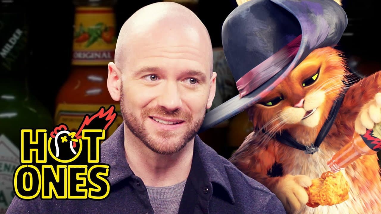 Still from Puss in Boots Can’t Feel His Tail While Eating Spicy Wings