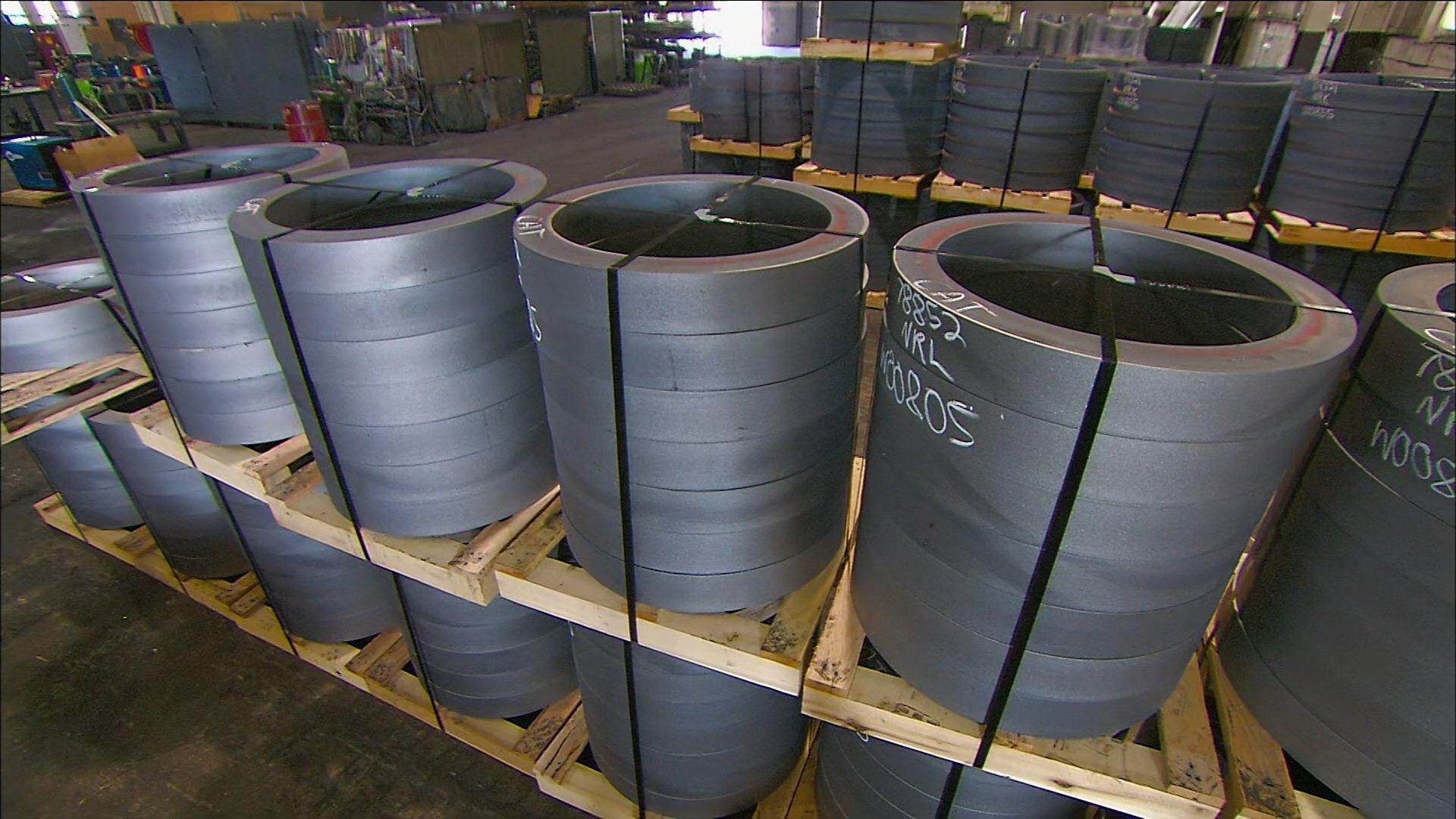 Still from Olive Oil, Lift Trucks, Seamless Rolled Rings, Ski Boots