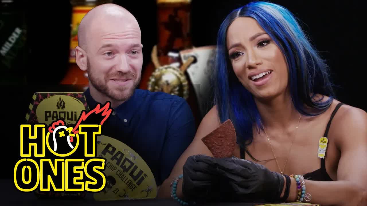 Still from Sean Evans and Sasha Banks Try the Paqui One Chip Challenge