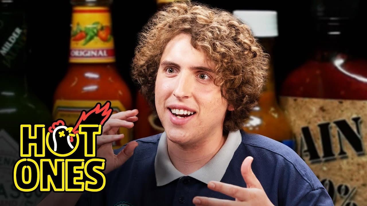 Still from Andrew Callaghan Goes for the Marrow While Eating Spicy Wings