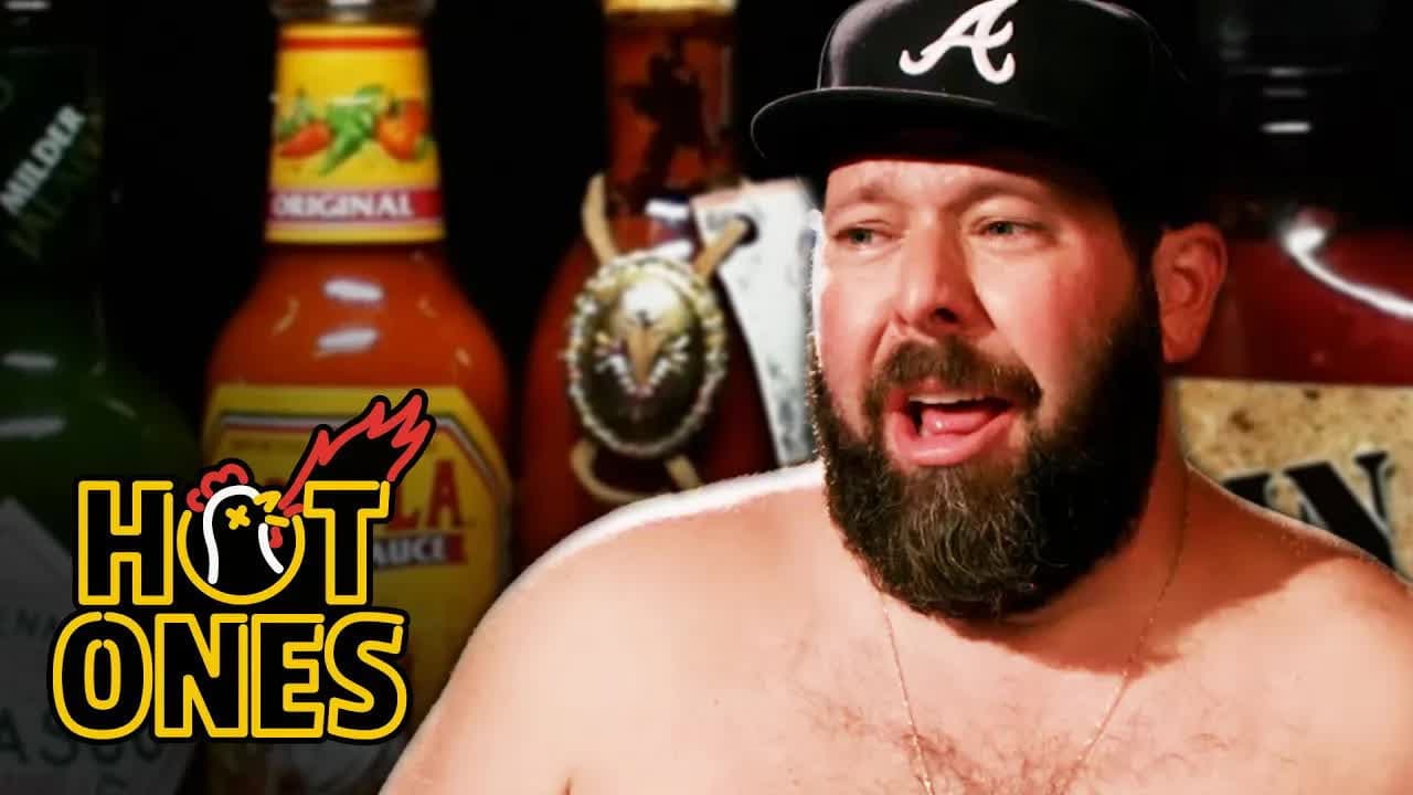 Still from Bert Kreischer Sweats Profusely Eating Spicy Wings