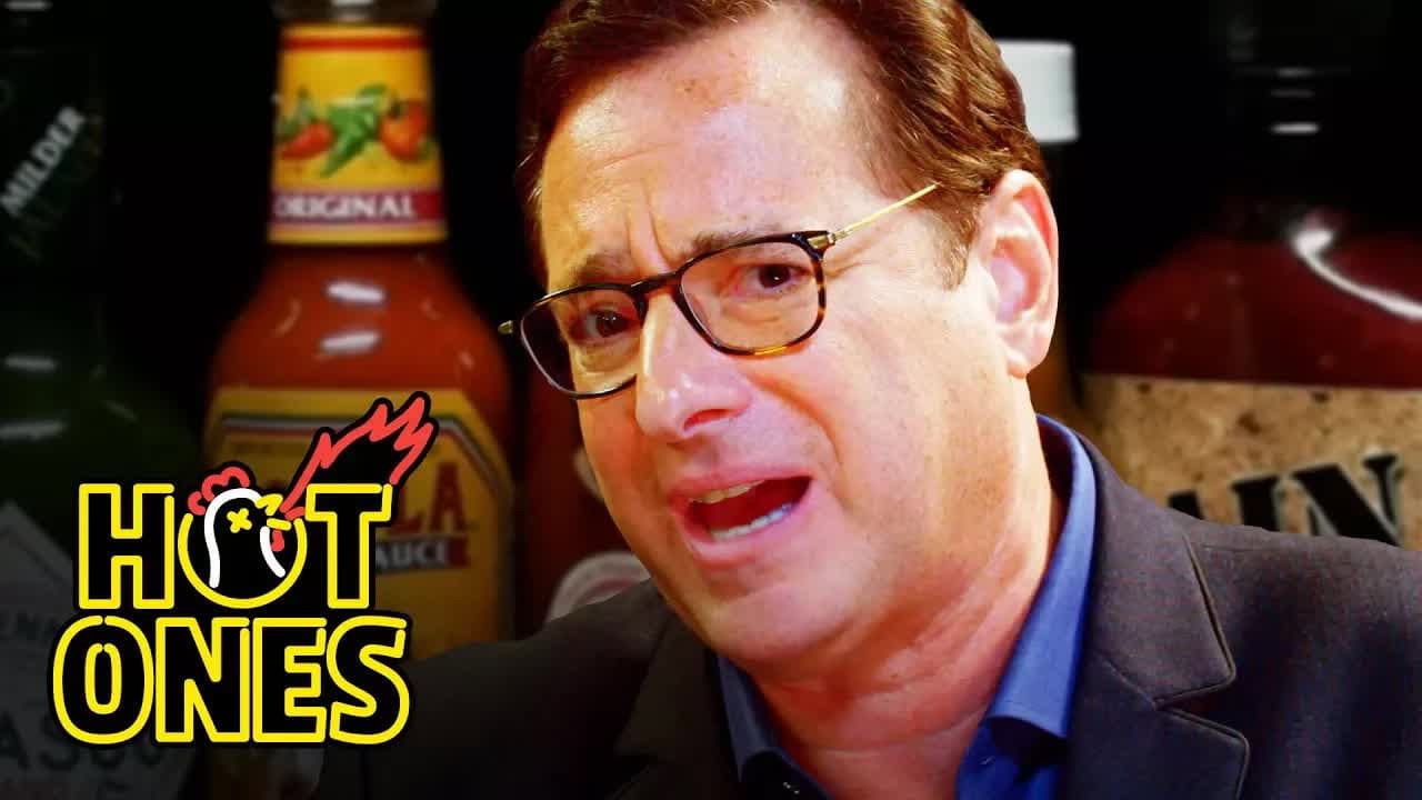 Still from Bob Saget Hiccups Uncontrollably While Eating Spicy Wings