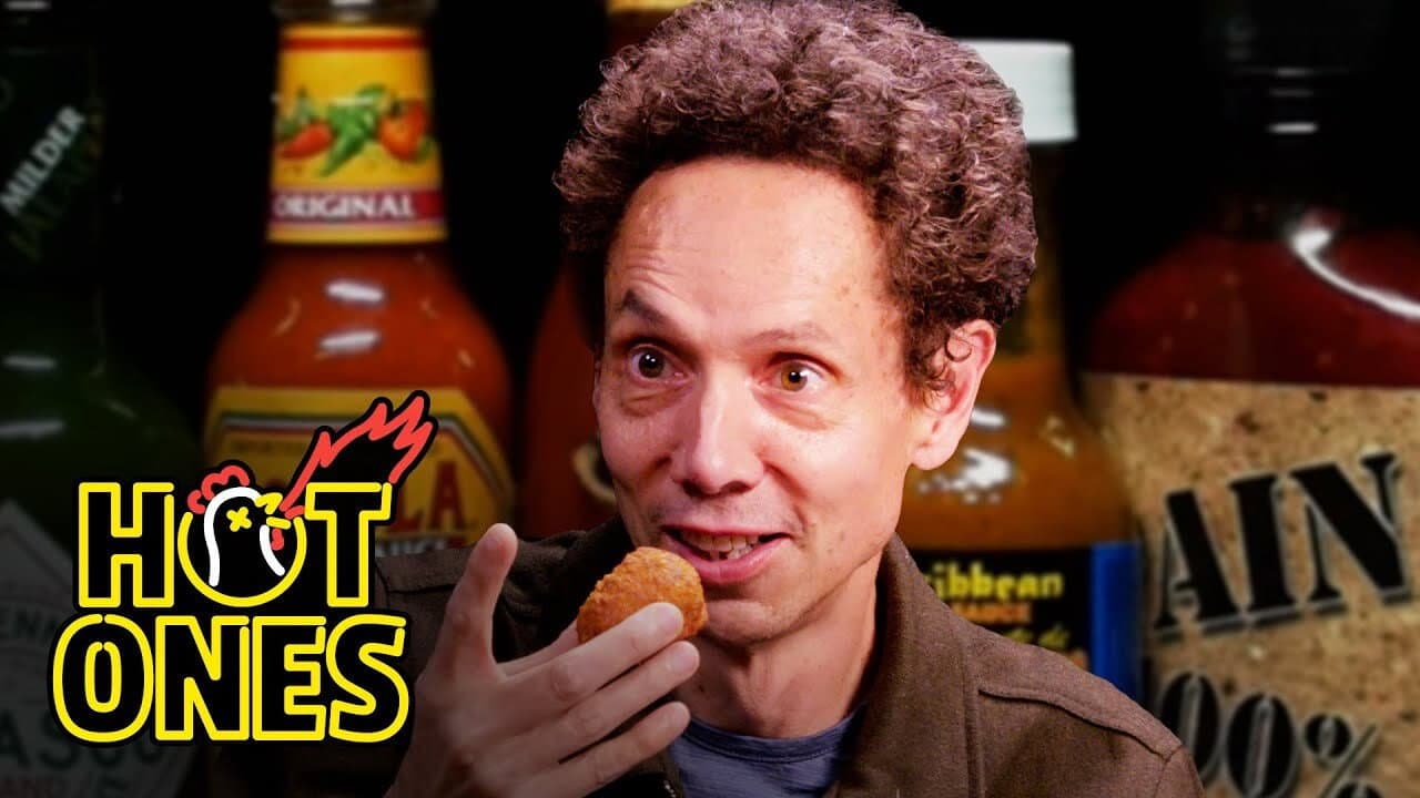 Still from Malcolm Gladwell Hits the Tipping Point While Eating Spicy Wings