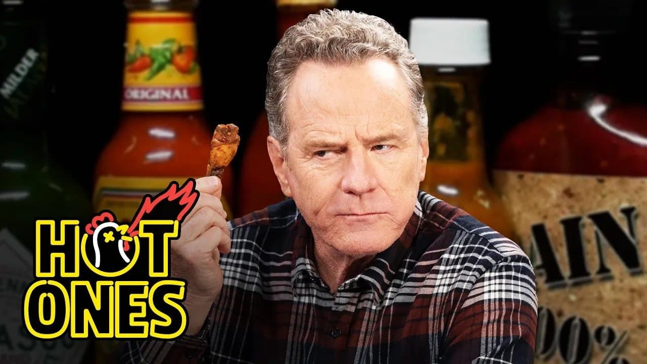 Still from Bryan Cranston Fully Commits While Eating Spicy Wings