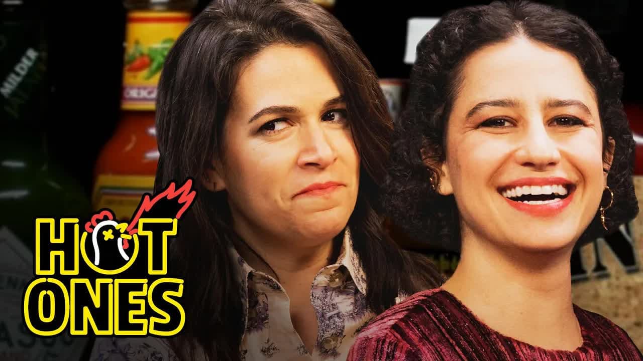 Still from Abbi and Ilana of Broad City Go Numb While Eating Spicy Wings